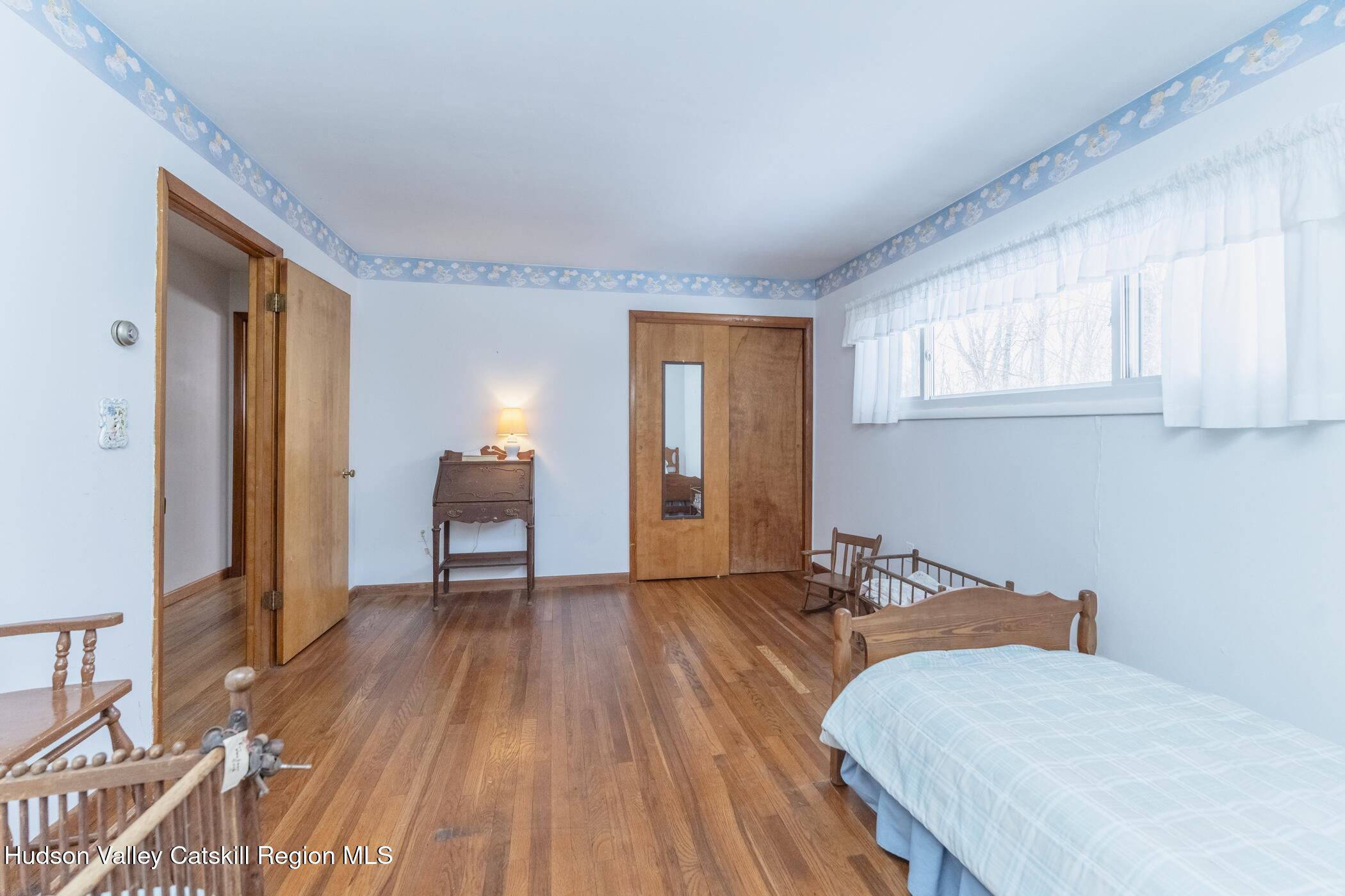 232 Cedar Hill Road High Falls, NY 12440 - Photo 27 of 42 a bedroom with a bed and window
