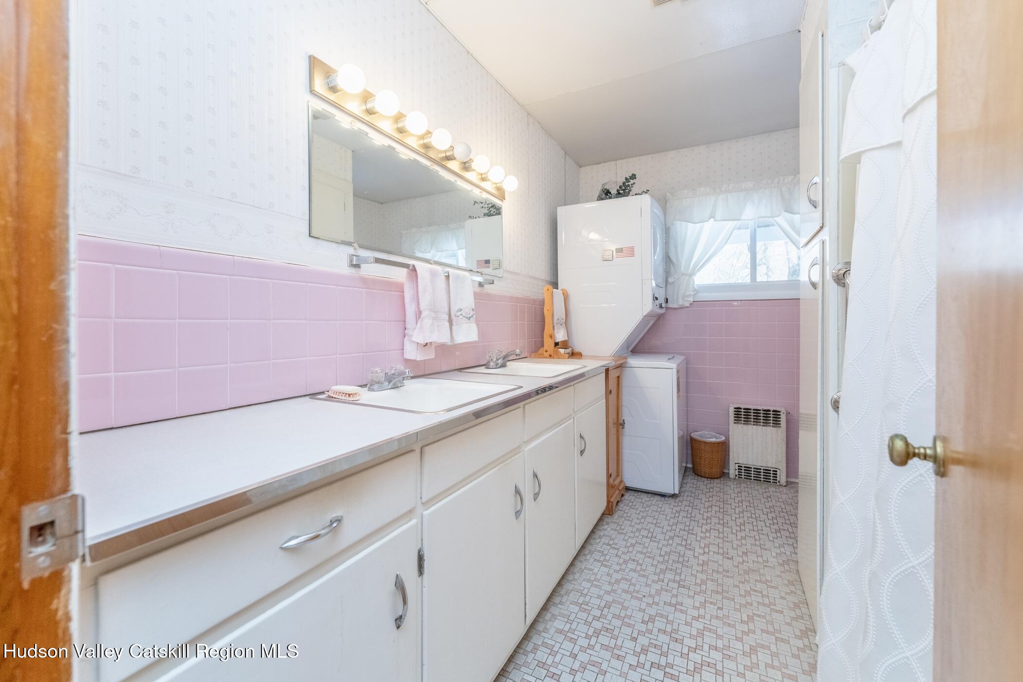 232 Cedar Hill Road High Falls, NY 12440 - Photo 29 of 42 a spacious bathroom with a sink a mirror and a toilet