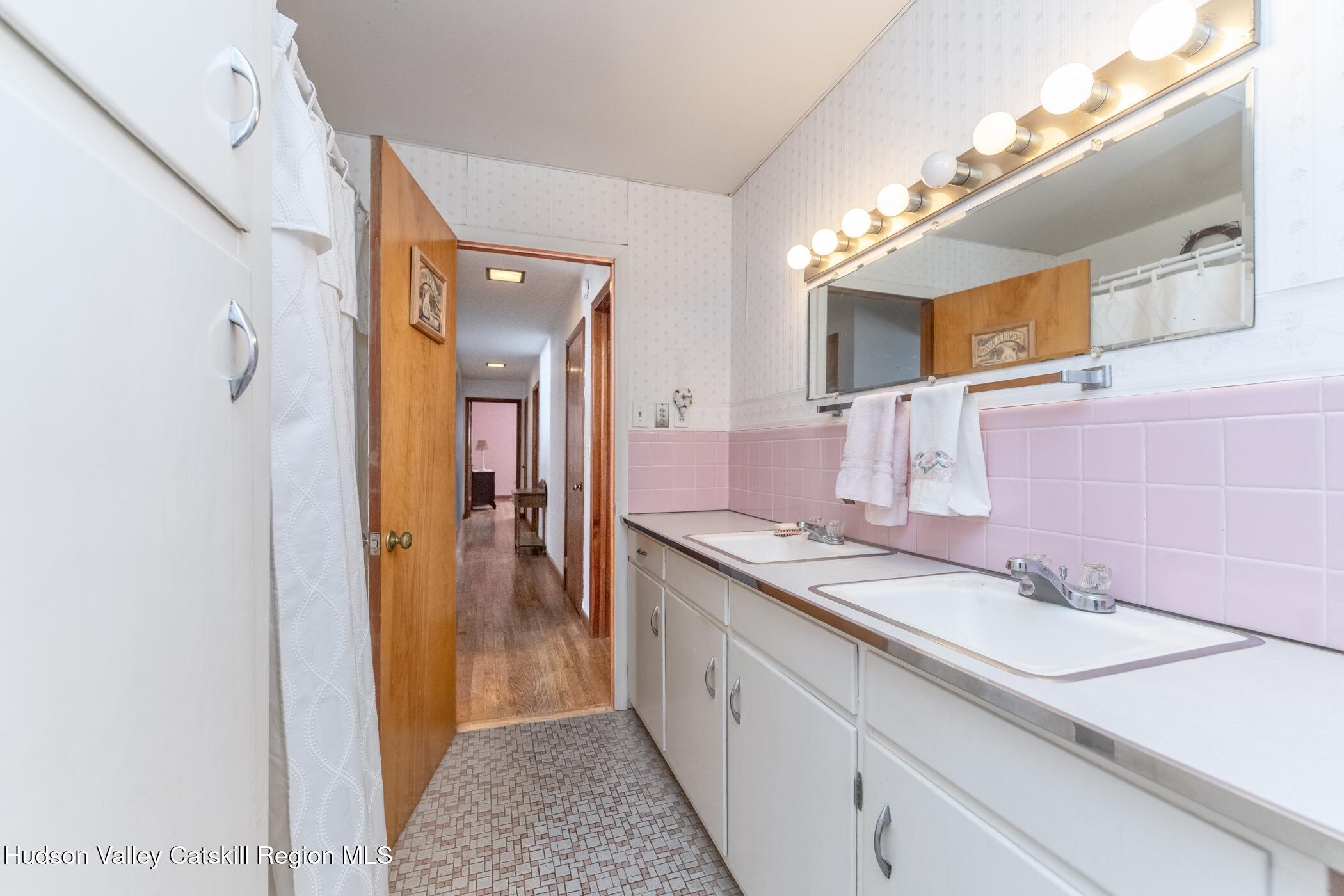 232 Cedar Hill Road High Falls, NY 12440 - Photo 30 of 42 a bathroom with a sink and a mirror
