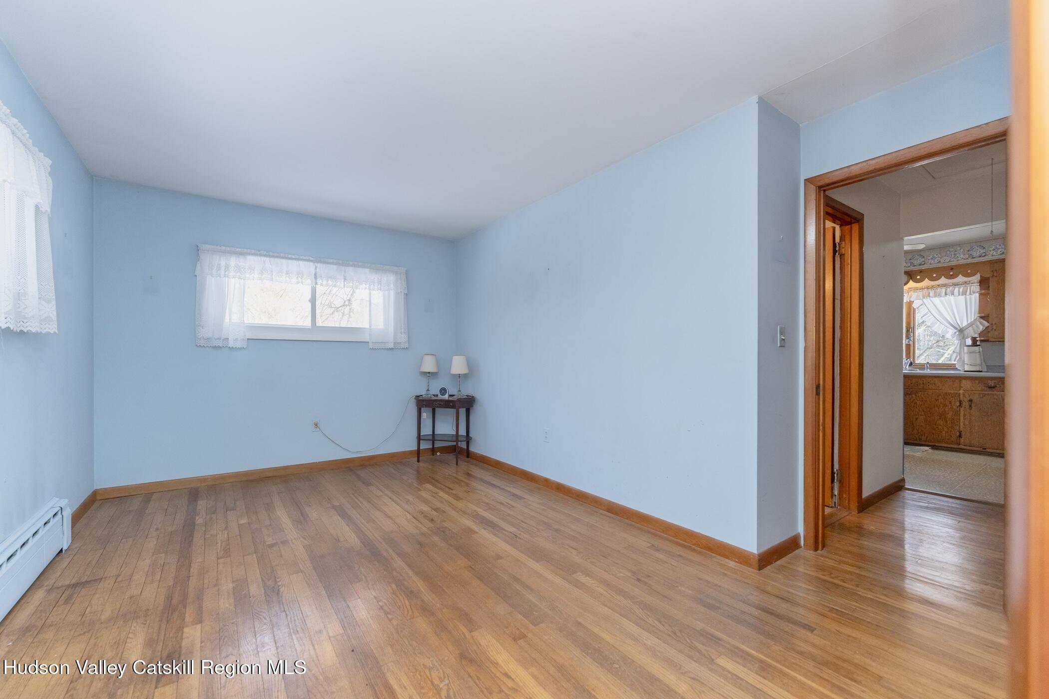 232 Cedar Hill Road High Falls, NY 12440 - Photo 31 of 42 a view of empty room with wooden floor and fan