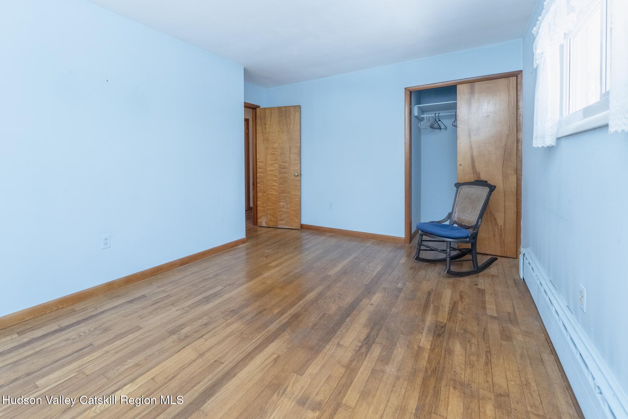 232 Cedar Hill Road High Falls, NY 12440 - Photo 32 of 42 a view of room with wooden floor and chair
