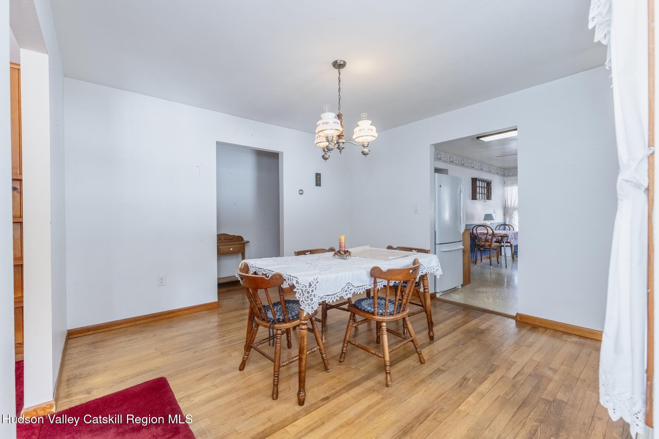232 Cedar Hill Road High Falls, NY 12440 - Photo 7 of 42 a view of a dining room with furniture and wooden floor