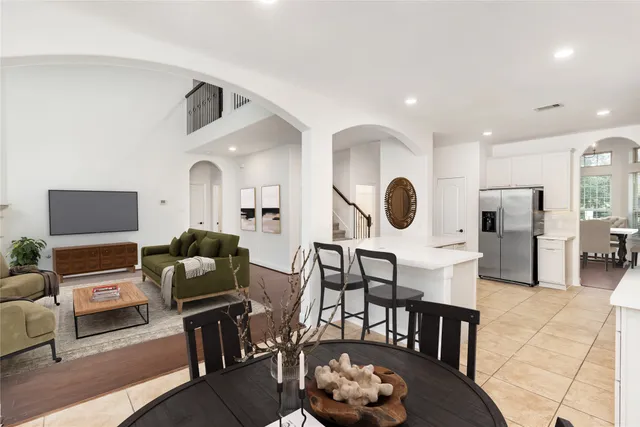 a living room with furniture and a table