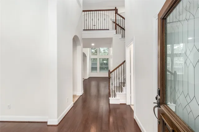 a view of a livingroom with stairs