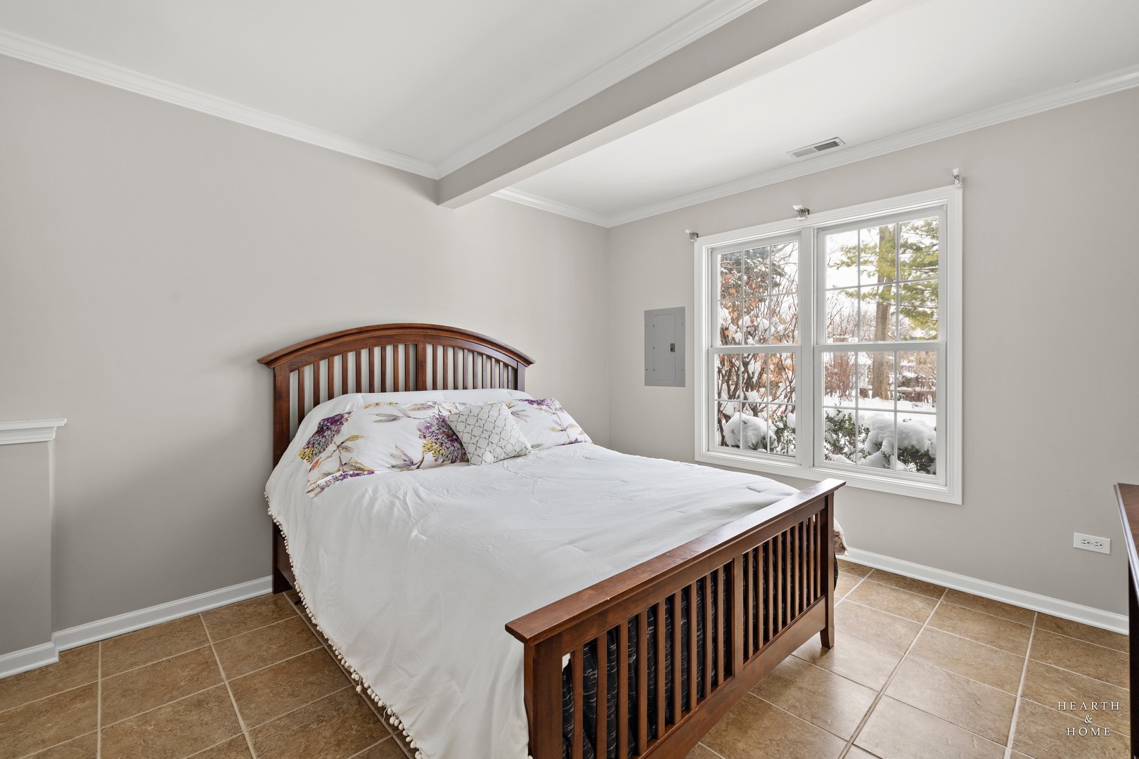 679 Barlina Road Crystal Lake, IL 60014 - Photo 23 of 28 a bedroom with a bed and a window