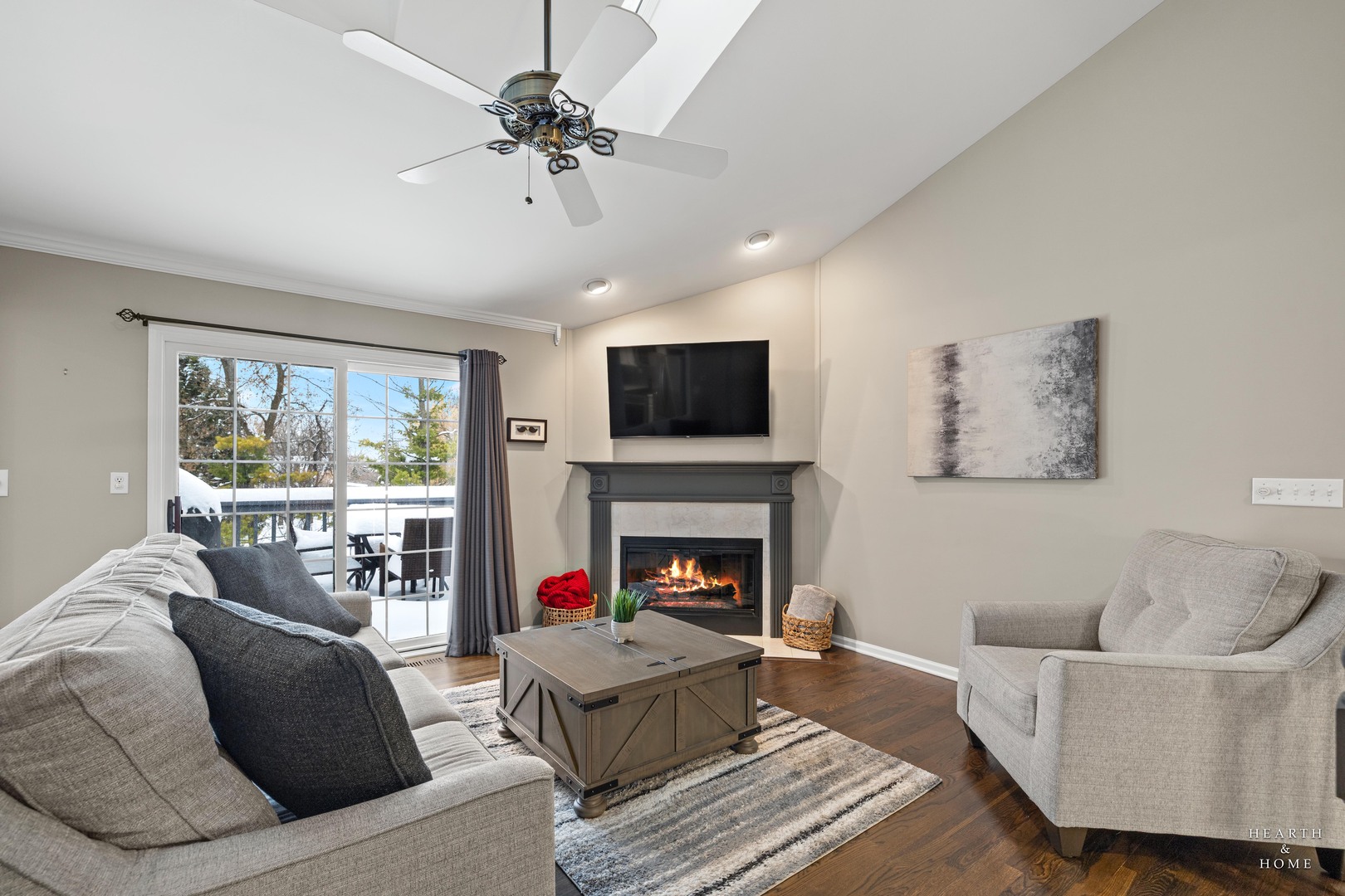 679 Barlina Road Crystal Lake, IL 60014 - Photo 3 of 28 a living room with furniture fireplace and a large window