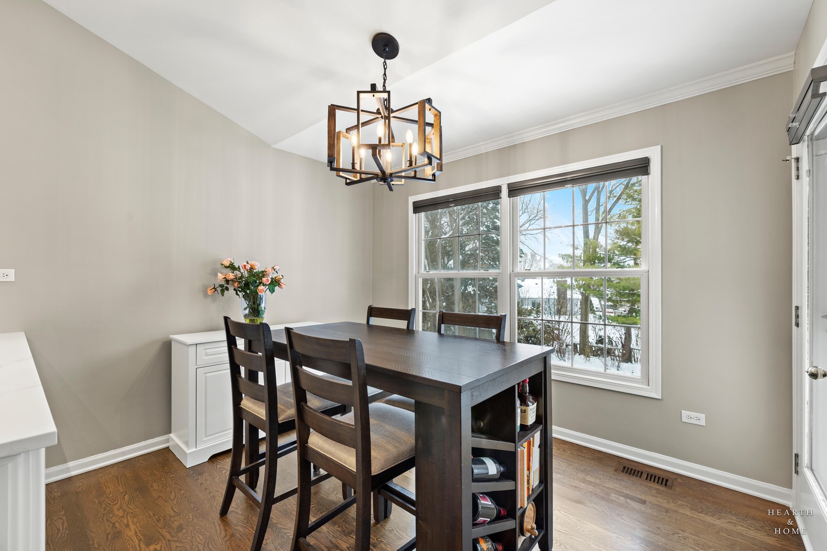 679 Barlina Road Crystal Lake, IL 60014 - Photo 8 of 28 a view of a dining room with furniture window and wooden floor