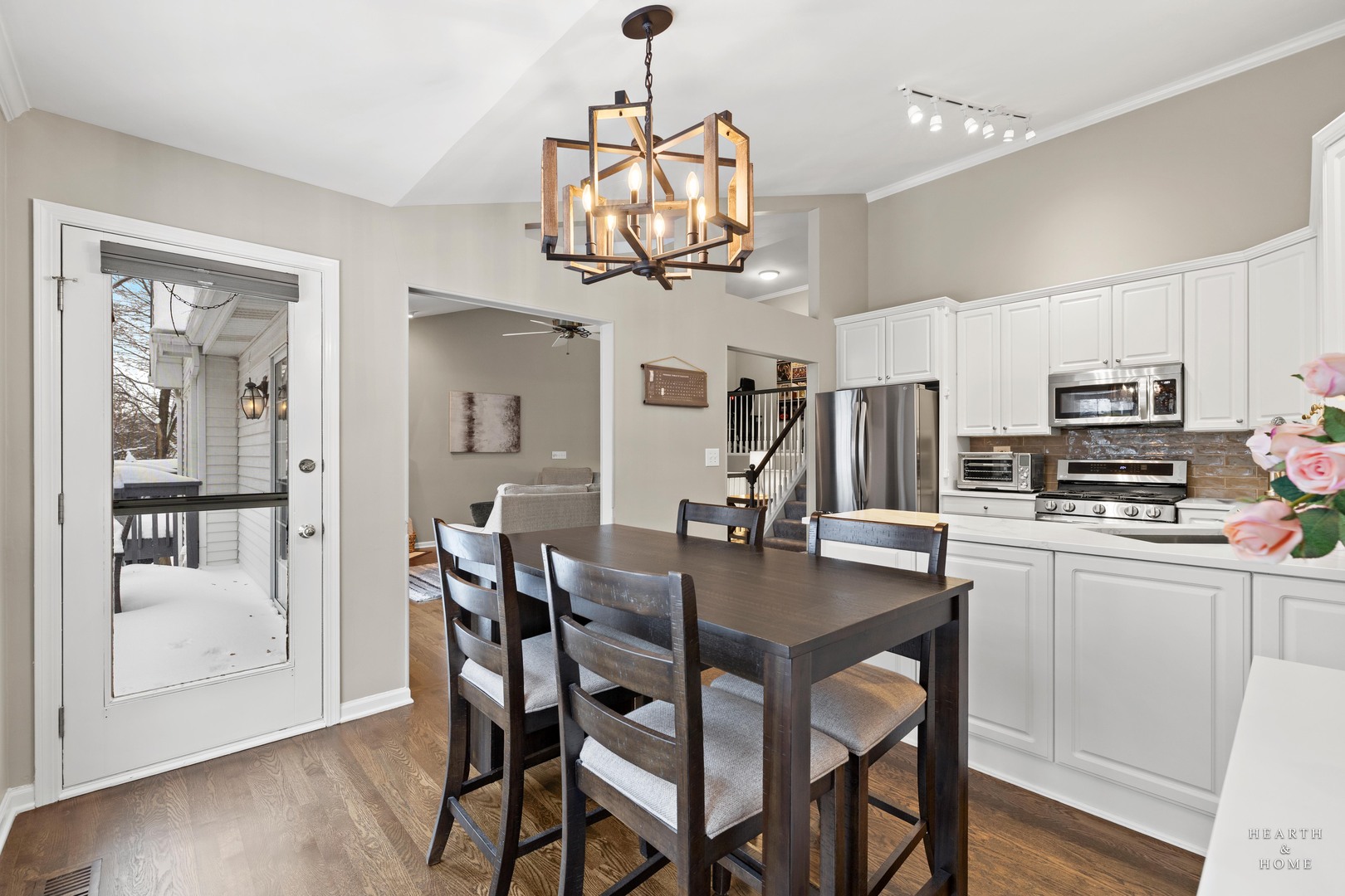 679 Barlina Road Crystal Lake, IL 60014 - Photo 9 of 28 a view of a dining room with furniture and wooden floor
