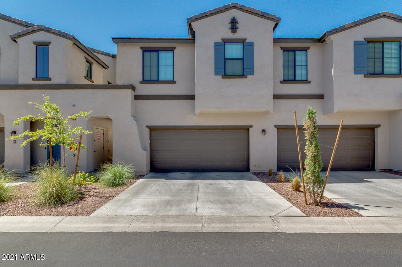 3900 East Baseline Road, Unit 135 Phoenix, AZ 85042 - Photo 19 of 19 a front view of a house with garden