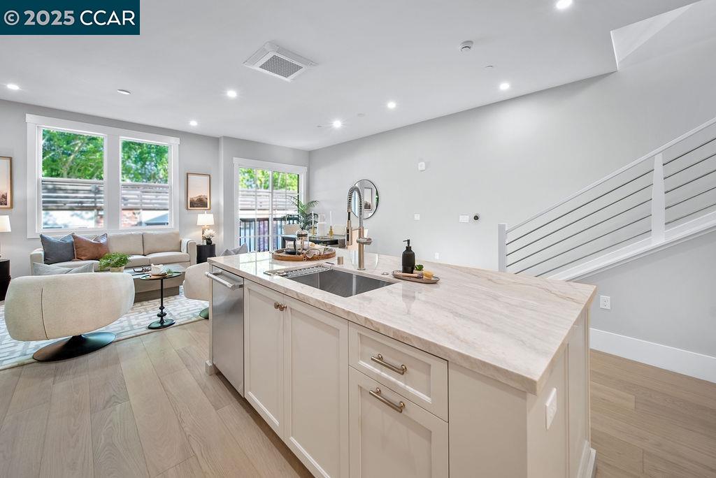 600 Hartz Avenue, Unit 103 Danville, CA 94526 - Photo 15 of 34 a kitchen with sink attached with living room