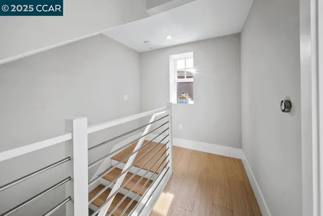 a view of entryway with wooden floor