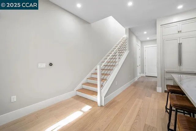 a view of entryway with wooden floor