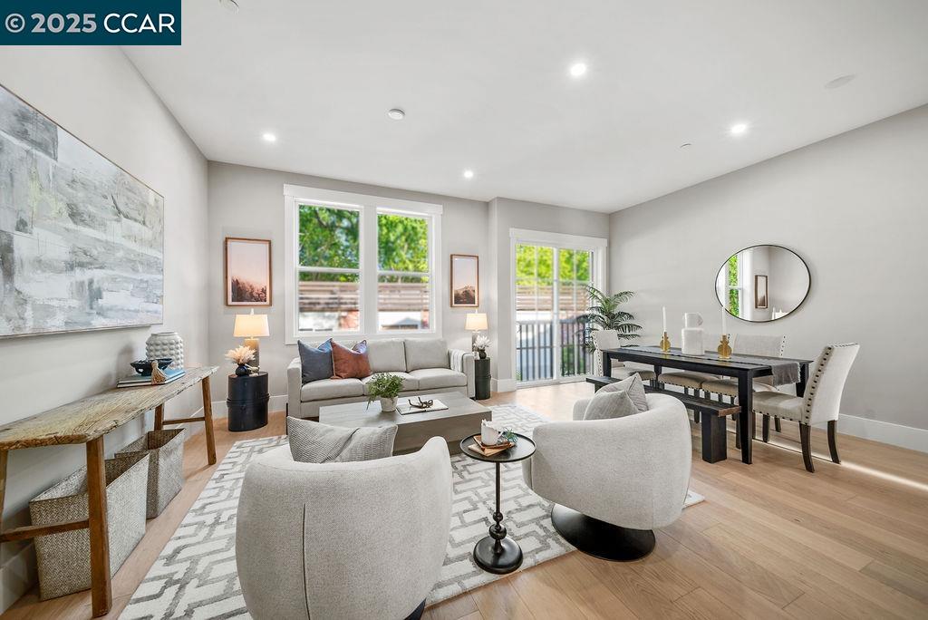600 Hartz Avenue, Unit 103 Danville, CA 94526 - Photo 7 of 34 a living room with fireplace furniture and a large window
