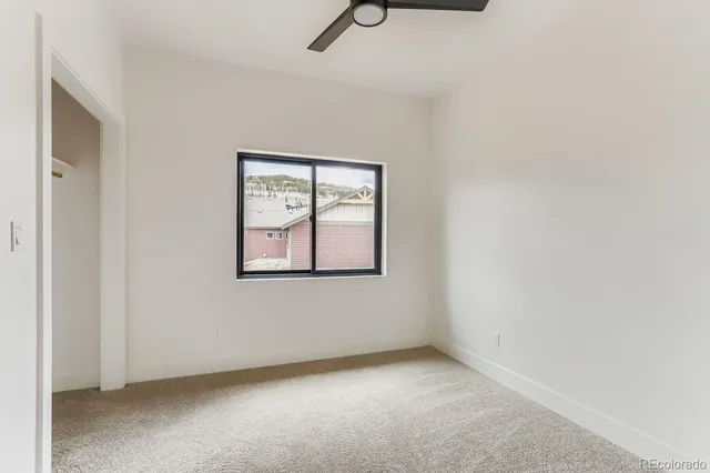 an empty room with windows