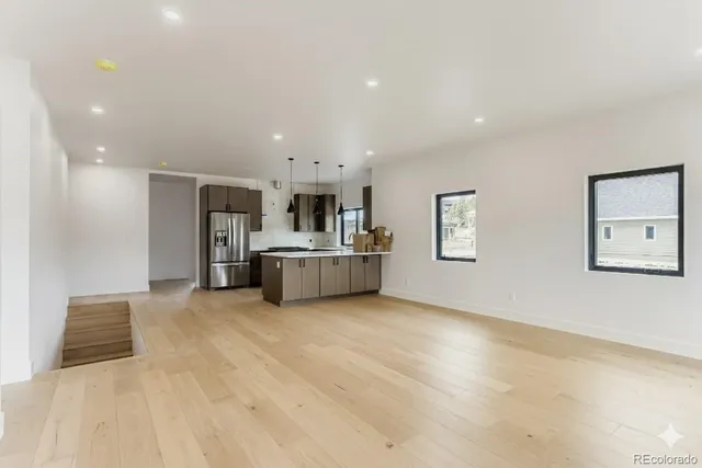 a view of a kitchen with a sink cabinets and a dishwasher