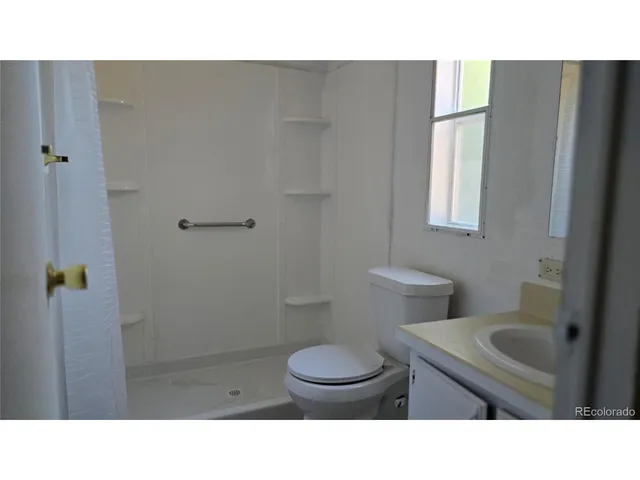 a black and white photo of a living room
