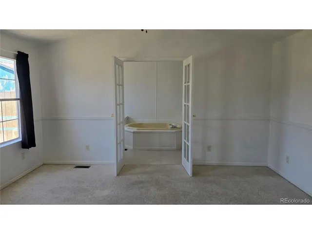 a open hall with a fireplace