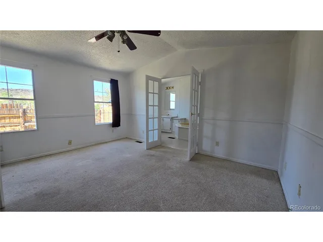 a bathroom with a toilet a sink and bathtub