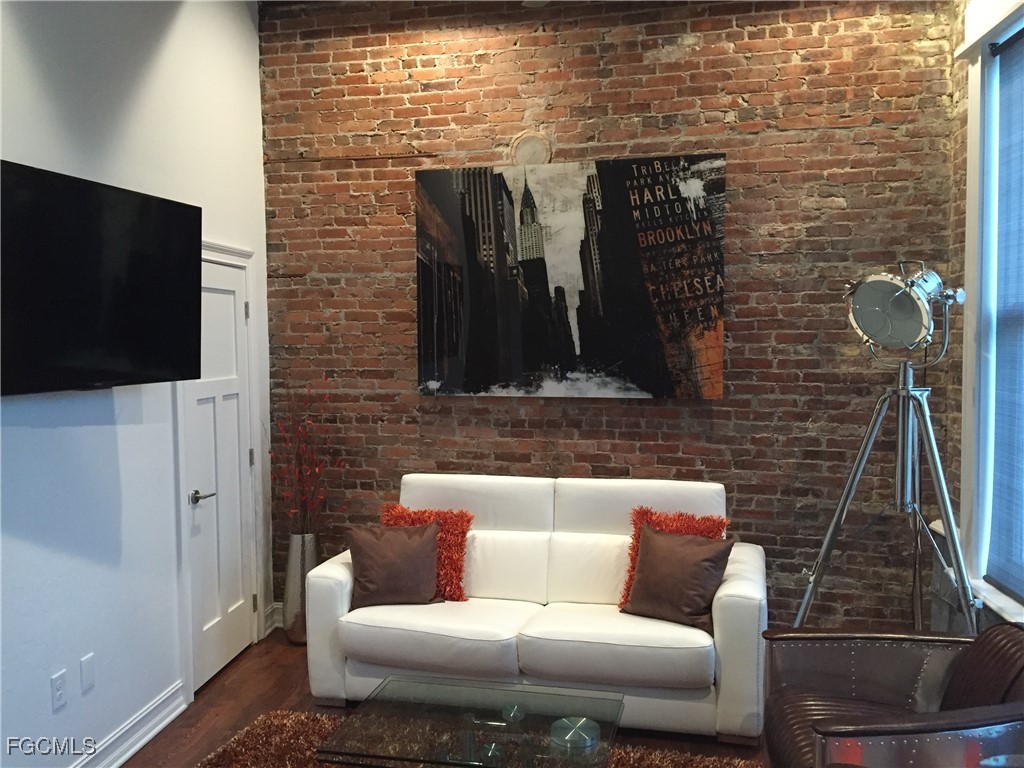 2278 First Street, Unit 204 Fort Myers, FL 33901 - Photo 16 of 24 a living room with furniture