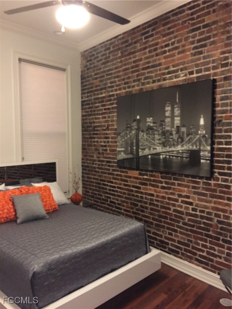 2278 First Street, Unit 204 Fort Myers, FL 33901 - Photo 23 of 24 a view of water heater room with wooden floor