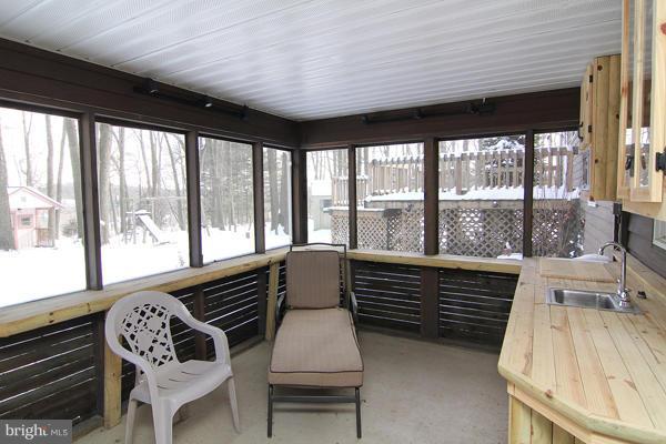 21601 Gunpowder Road Manchester, MD 21102 - Photo 21 of 30 a outdoor space with a large window and couch