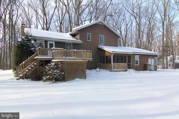 21601 Gunpowder Road Manchester, MD 21102 - Photo 28 of 30 a front view of a house with a garden