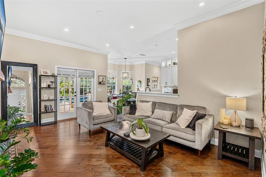 1674 Victoria Way Winter Garden, FL 34787 - Photo 17 of 42 a living room with furniture and a large window