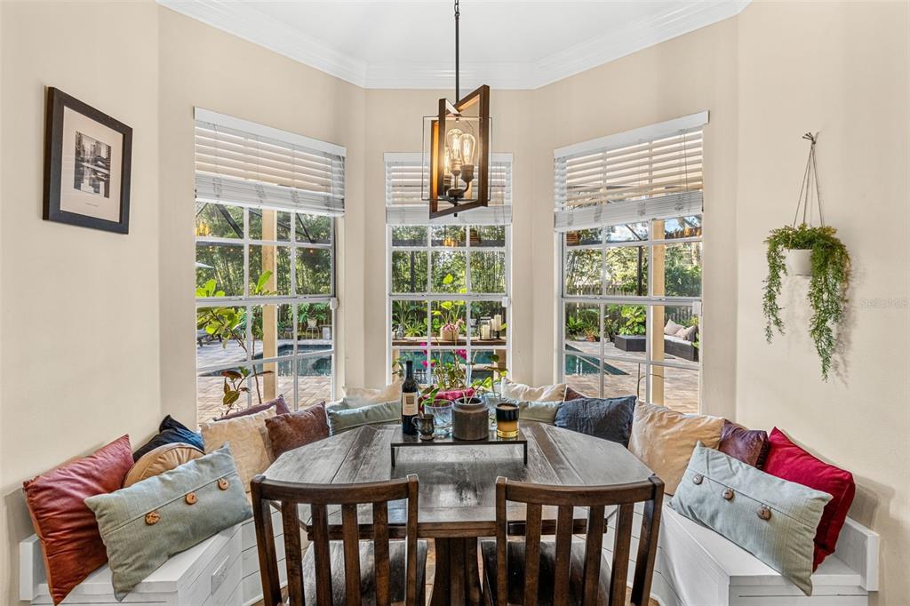 1674 Victoria Way Winter Garden, FL 34787 - Photo 18 of 42 a view of a dining room with furniture window and outside view