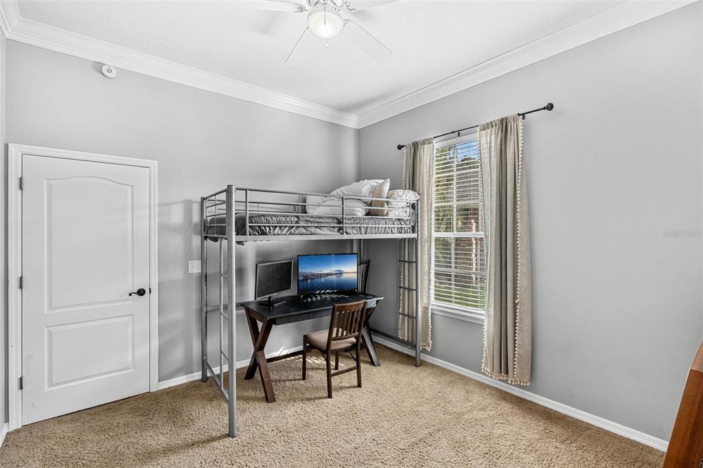 1674 Victoria Way Winter Garden, FL 34787 - Photo 20 of 42 a view of a workspace with furniture and a window