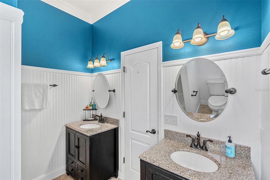 1674 Victoria Way Winter Garden, FL 34787 - Photo 21 of 42 a bathroom with a sink and a mirror