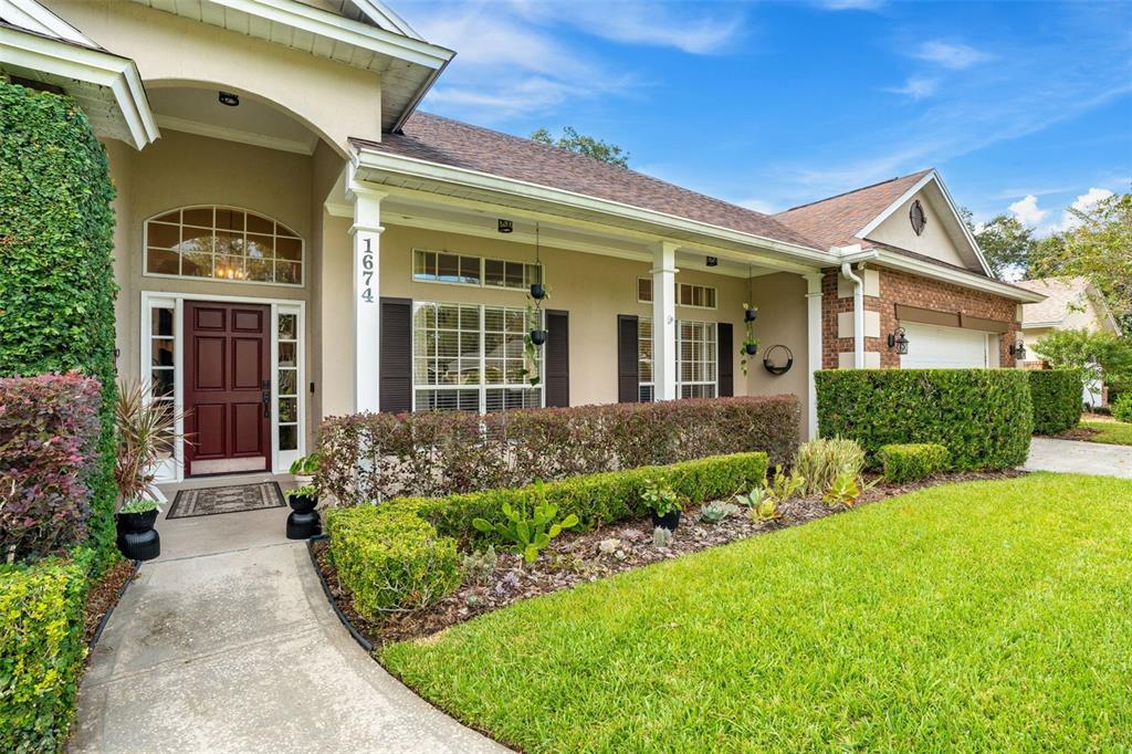 1674 Victoria Way Winter Garden, FL 34787 - Photo 5 of 42 front view of a house with a yard