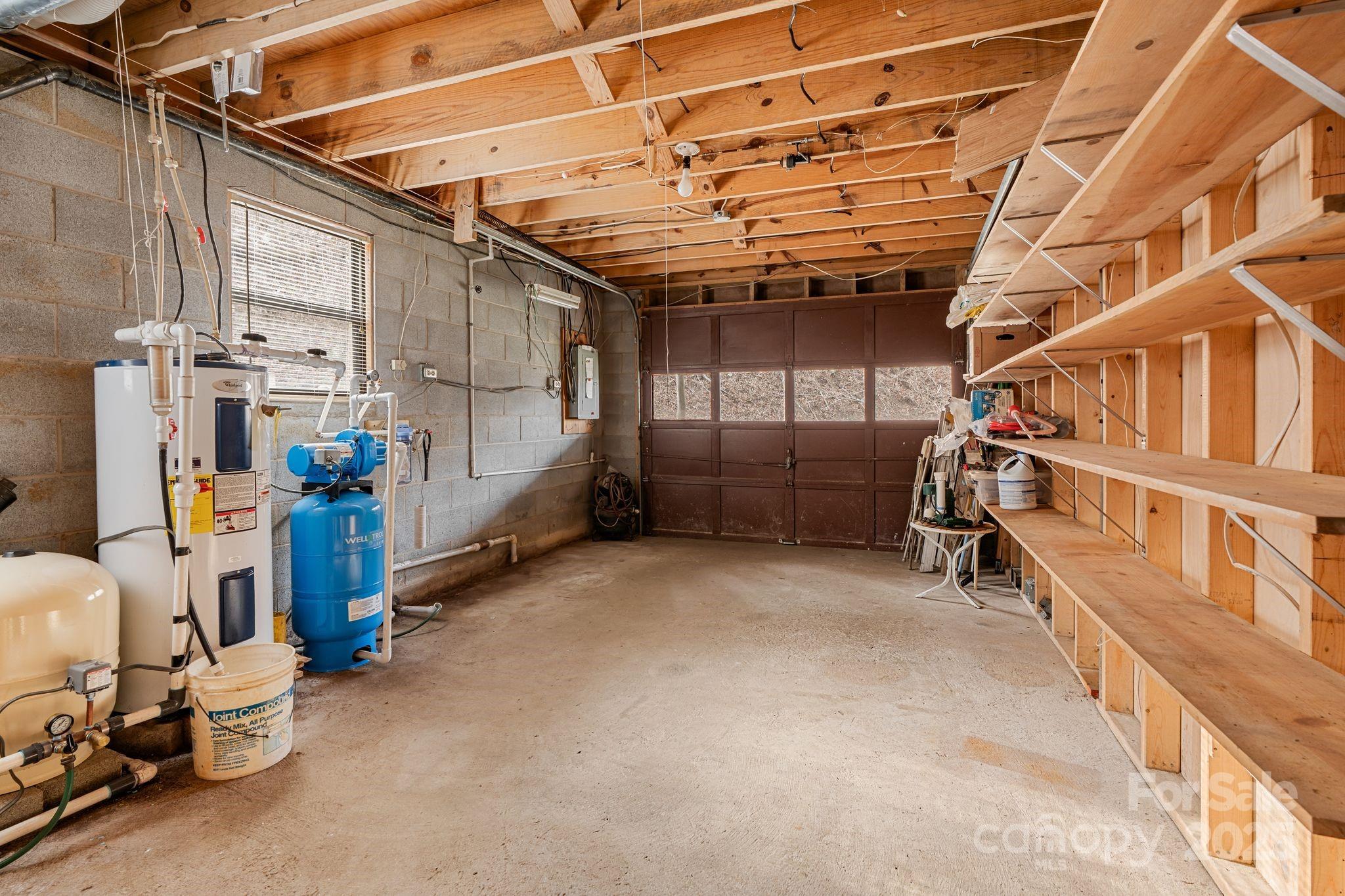 2650 Secluded Valley Road Marshall, NC 28753 - Photo 25 of 36 a view of storage and utility room