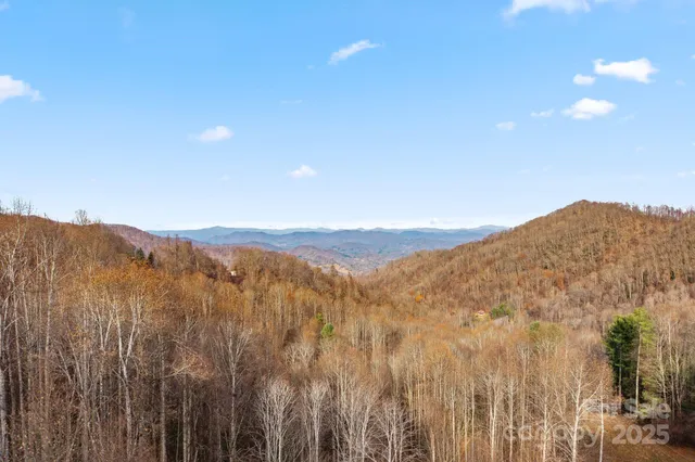 a view of mountain view with mountains in the background