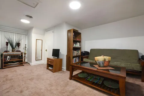 a living room with furniture and a couch