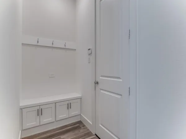 a view of an empty walk in closet