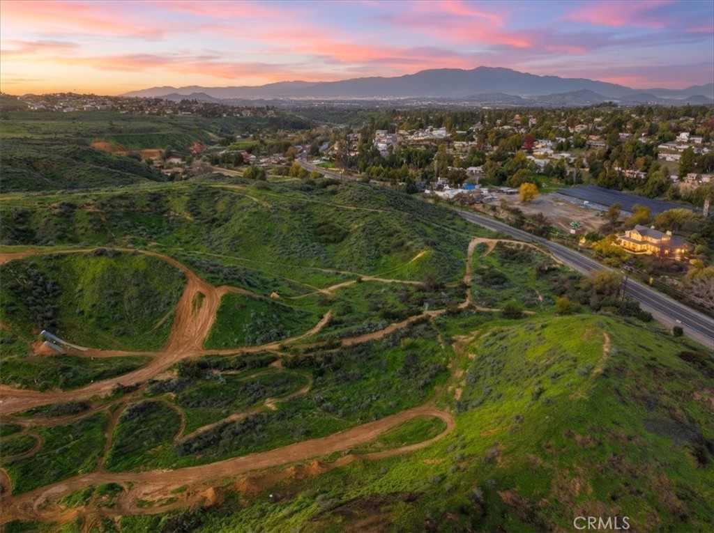 0 Sunrise Mesa Drive Riverside, CA 92504 - Photo 1 of 11 a view of a city with lush green forest