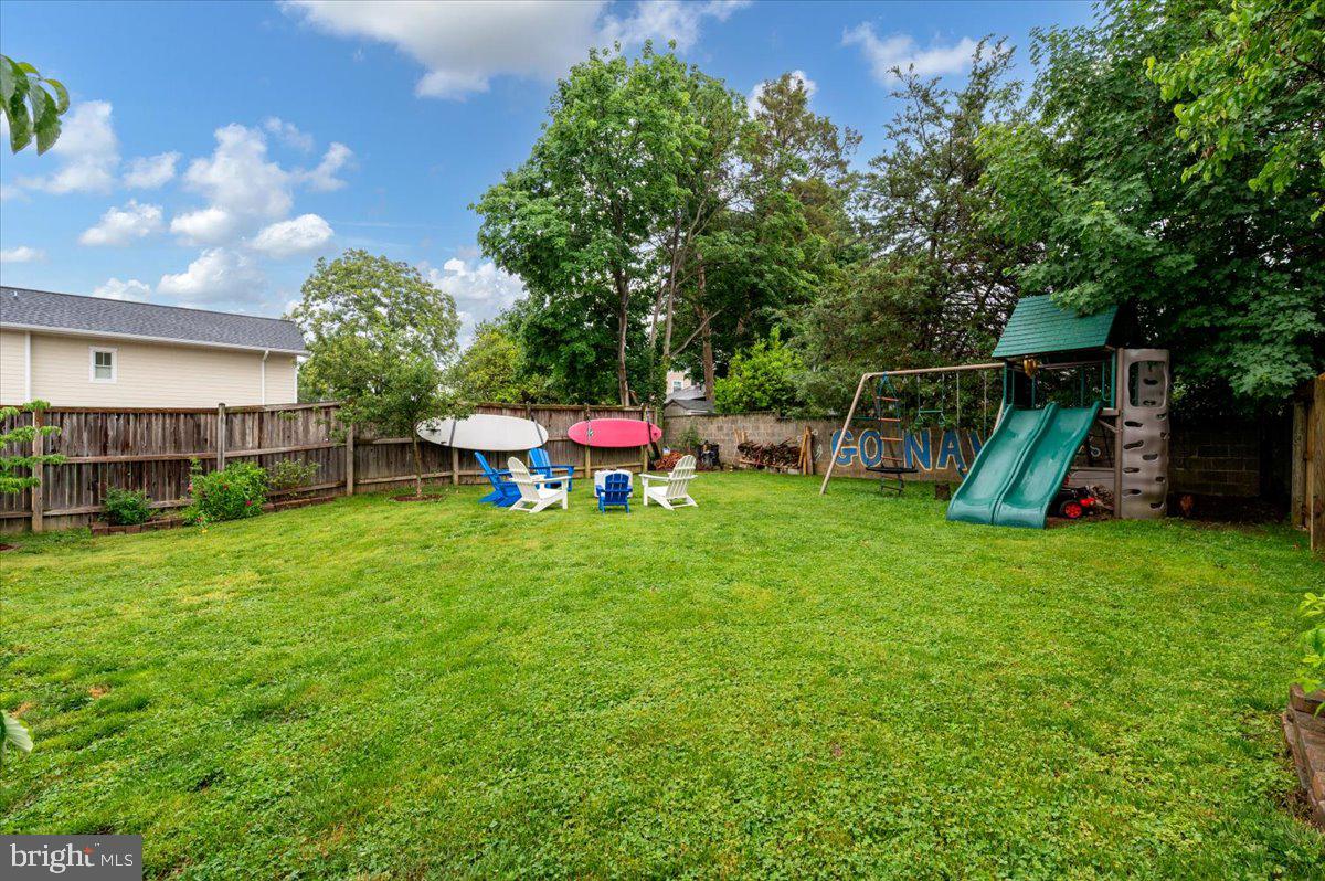 57 Spa Road Annapolis, MD 21401 - Photo 34 of 39 a view of a wooden deck and a yard