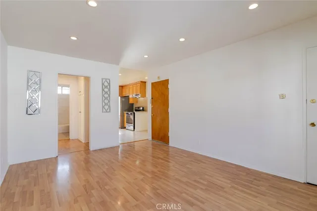 a view of a livingroom with wooden floor