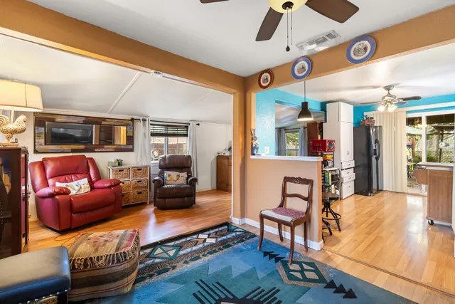 a view of a dining room with furniture