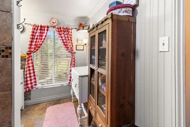 a bathroom with a sink a vanity and a mirror