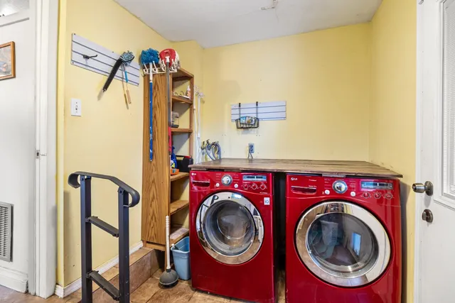 a view of a backyard with plants and a patio