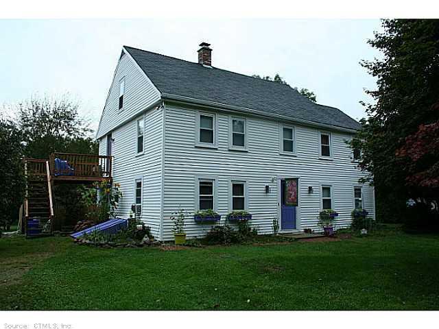 223 Browning Road Norwich, CT 06360 - Photo 1 of 1 a front view of house with yard and green space