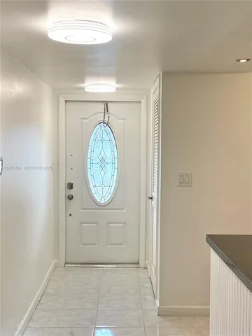 a view of a hallway with elevator