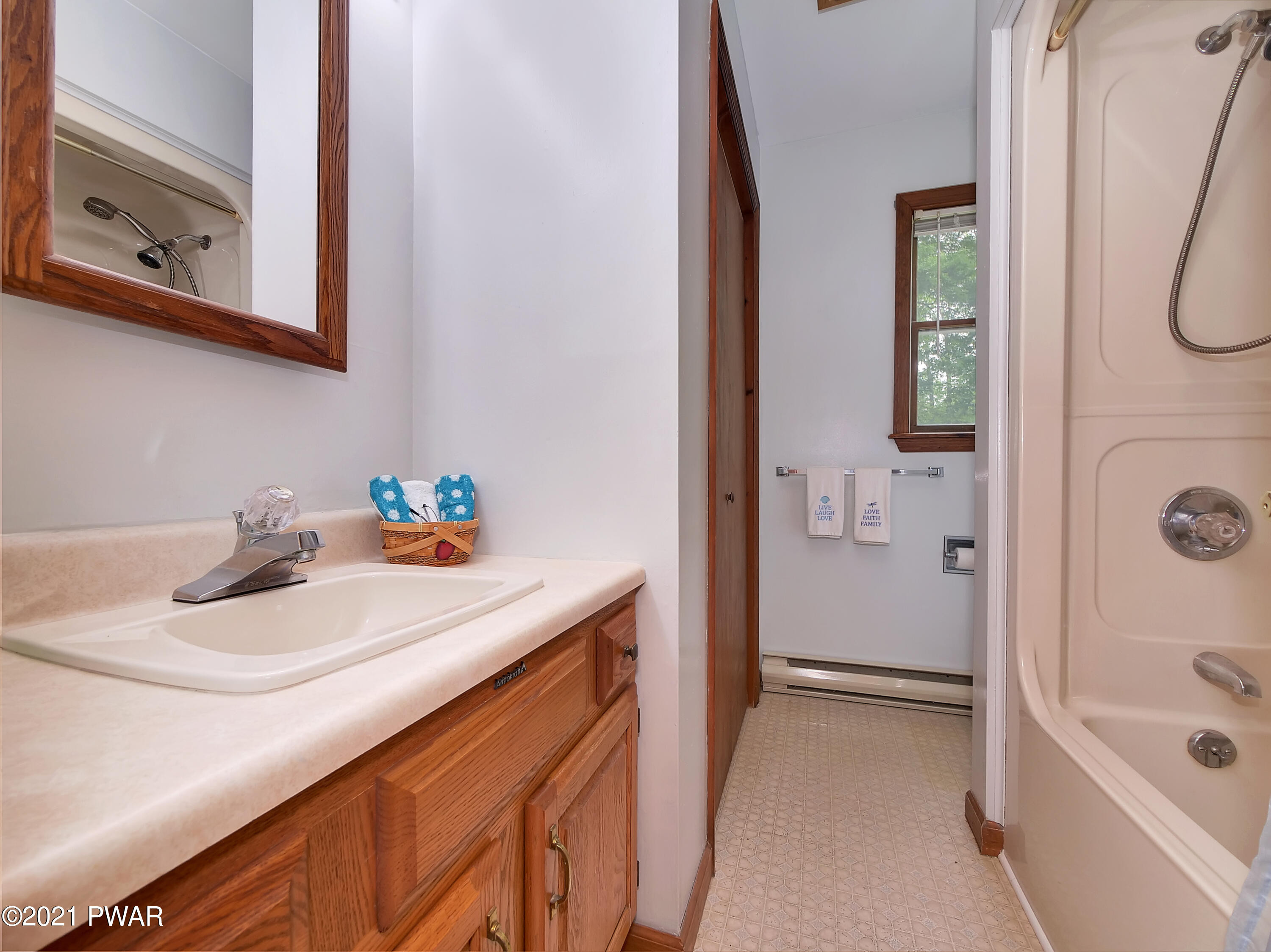 149 Yale Road Milford, PA 18337 - Photo 17 of 29 a bathroom with a sink a toilet and shower