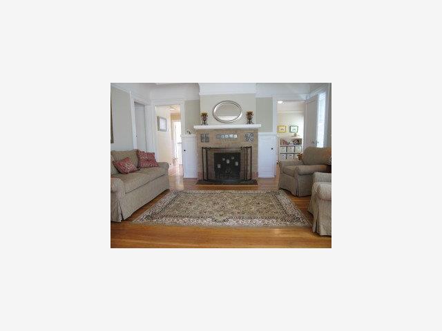18 Victoria Road Burlingame, CA 94010 - Photo 3 of 9 a living room with furniture and a fireplace