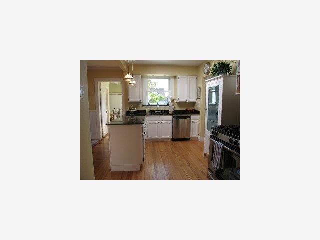 18 Victoria Road Burlingame, CA 94010 - Photo 4 of 9 a open kitchen with sink and refrigerator