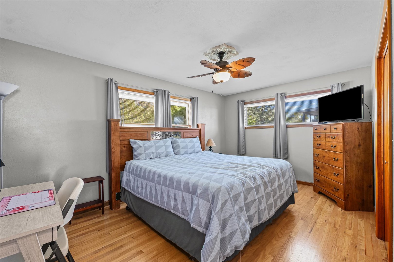 209 West Main Street Royal, IL 61871 - Photo 18 of 32 a bedroom with a bed and a flat screen tv