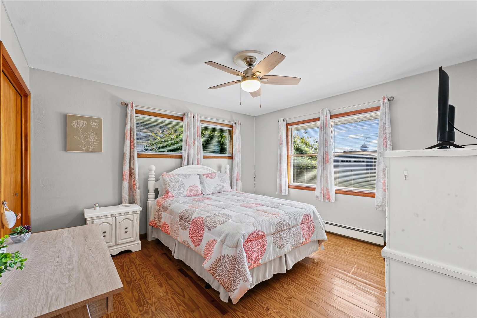 209 West Main Street Royal, IL 61871 - Photo 20 of 32 a bedroom with a bed lamp and a large window