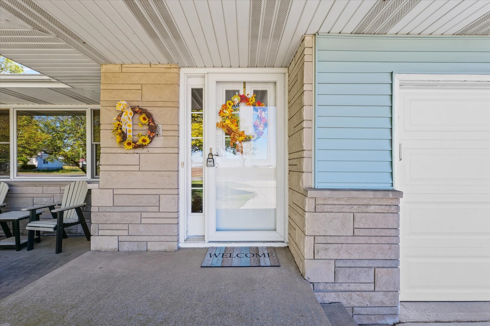 209 West Main Street Royal, IL 61871 - Photo 3 of 32 a view of a entryway door of the house
