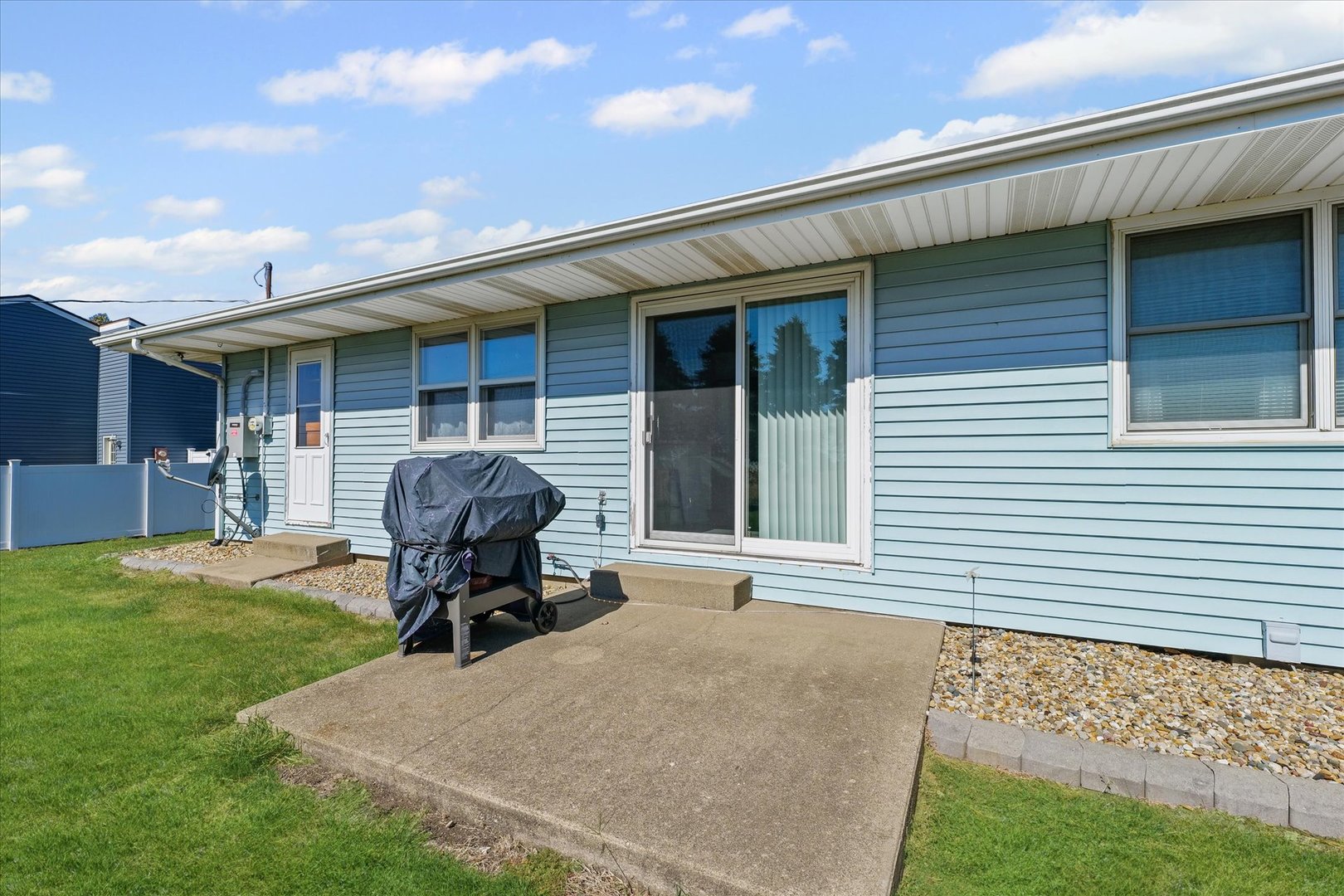 209 West Main Street Royal, IL 61871 - Photo 31 of 32 a view of a backyard with table and chairs